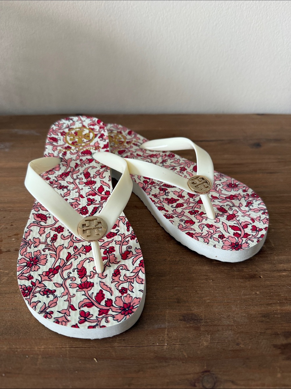 Tory Burch Floral Logo Flip Flops in Pink and Cream